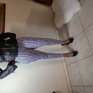 Blue and white tight fitting pants.